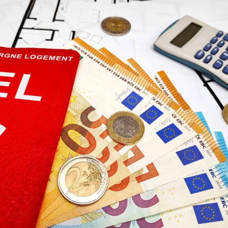 CEL filled with euro banknotes atop of a stack of blueprints. The Compte Epargne Logement (CEL) is a housing savings plan (CEL) offered by French banks.