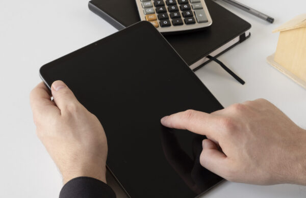 close-up-hands-holding-tablet